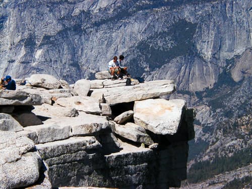 me eating lunch on top of half dome